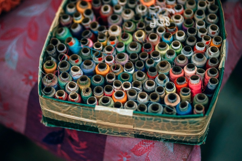 Industrial textile threads on a production line