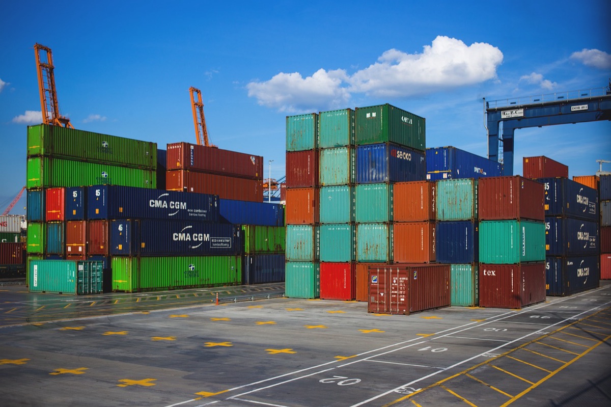 Cargo containers and crates stacked on a port pier